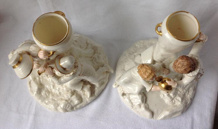 pair of porcelain Royal Worcester figures modelled by James Hadley for Royal Worcester 1882